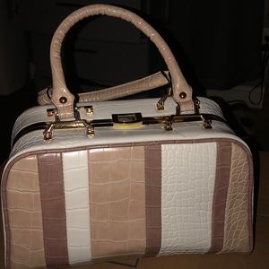 Cute duffel clutch handbag.
